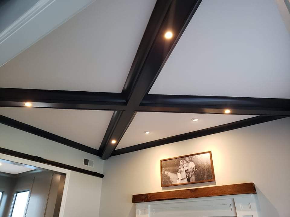 Vaulted ceiling with painted black beams